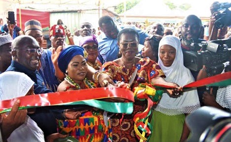 Dr Mahamudu Bawumia (left), the Vice-President, being assisted by Ursula Owusu Ekuful (2nd from right), Member of Parliament for Ablekuma West, and some dignitaries to cut the tape to inaugurate the Tunga Islamic School building. Picture: ELVIS NII NOI DOWUONA